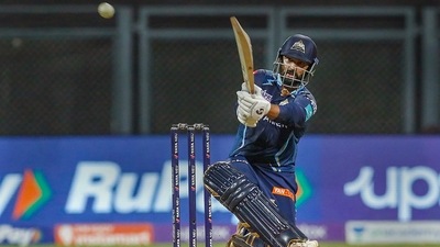Tewatia however kept GT in the chase. He ended the match unbeaten on 40 off 21 balls. (PTI) Tewatia however kept GT in the chase. He ended the match unbeaten on 40 off 21 balls. (PTI)