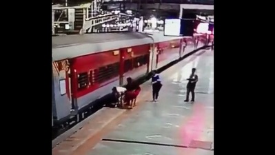 The image, taken from the Twitter video, shows the person being saved. (Twitter/@RailMinIndia)