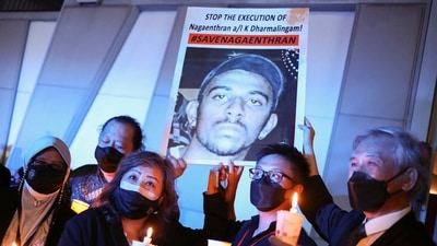 People took part in a vigil ahead of the planned execution of Malaysian drug trafficker Nagaenthran Dharmalingam, outside Singapore High Commission in Kuala Lumpur, Malaysia, Tuesday. (REUTERS)