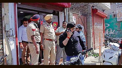 Barricaded with an intruder who was attempting to sexually assault her, a 23-year-old woman jumped from the second-floor of a showroom in Jamalpur on Radha Swami Road on Wednesday. (Harvinder Singh/HT) Barricaded with an intruder who was attempting to sexually assault her, a 23-year-old woman jumped from the second-floor of a showroom in Jamalpur on Radha Swami Road on Wednesday. (Harvinder Singh/HT)