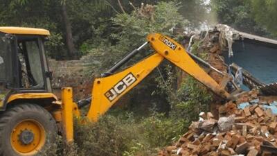 Enforcement wing of the Chandigarh Housing Board demolished illegal constructions in four houses of Sector 41. (HT File) Enforcement wing of the Chandigarh Housing Board demolished illegal constructions in four houses of Sector 41. (HT File)