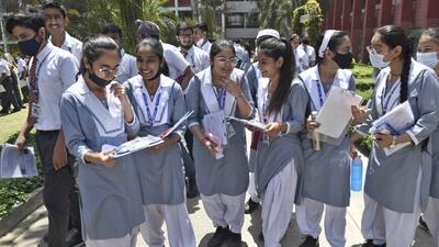 CBSE board Class 10 students discussing the English subject question paper after exam hours in GNPS School, Sarabha Nagar, in Ludhiana on April 27, 2022. (Gurpreet Singh/HT)