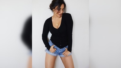 Neha Sharma kept her look as simple as possible and accessorised it with just a small golden pendant. (Instagram/@nehasharmaofficial) Neha Sharma kept her look as simple as possible and accessorised it with just a small golden pendant. (Instagram/@nehasharmaofficial)