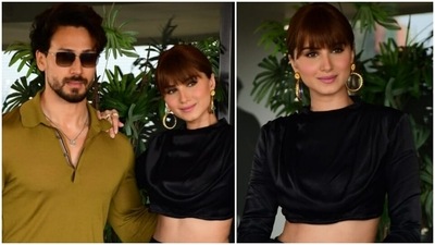 Tara Sutaria in crop top and mini skirt adds vintage glamour to Heropanti 2 promotions with Tiger Shroff: See pics (HT Photo/Varinder Chawla) Tara Sutaria in crop top and mini skirt adds vintage glamour to Heropanti 2 promotions with Tiger Shroff: See pics (HT Photo/Varinder Chawla)