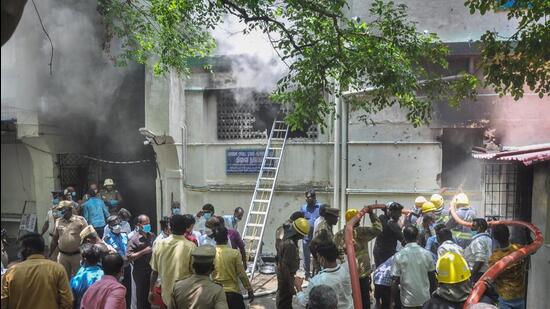 Firefighters try to douse a fire that broke out due to a short circuit at Rajiv Gandhi Government Hospital, in Chennai on Wednesday. (PTI)