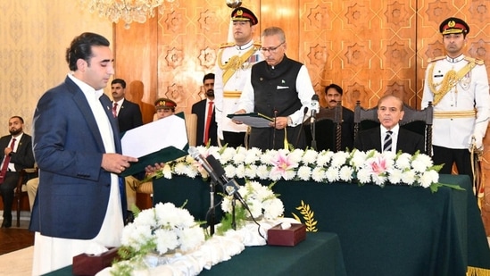 Bilawal Bhutto Zardari, son of assasinated former prime minister Benazir Bhutto, and the chief of coalition ally Pakistan Peoples Party (PPP), takes oath as the new foreign minister from the Pakistan's President Arif Alvi, in Islamabad.(REUTERS)