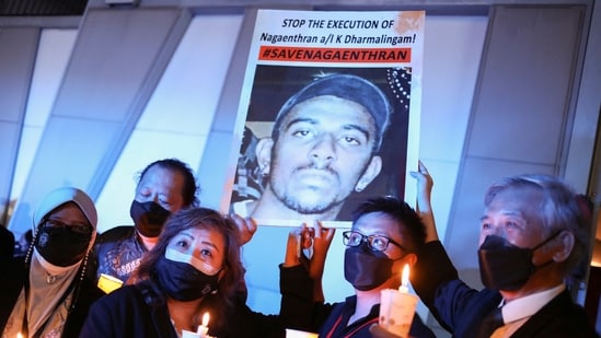 People took part in a vigil ahead of the planned execution of Malaysian drug trafficker Nagaenthran Dharmalingam, outside Singapore High Commission in Kuala Lumpur, Malaysia, Tuesday.(REUTERS)