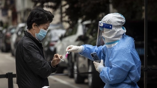 Residents take part in a round of Covid-19 testing during a lockdown in Shanghai, China (Bloomberg)