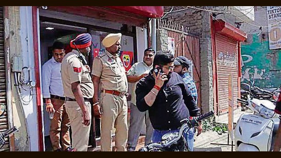 Barricaded with an intruder who was attempting to sexually assault her, a 23-year-old woman jumped from the second-floor of a showroom in Jamalpur on Radha Swami Road on Wednesday. (Harvinder Singh/HT)