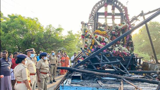 Mangled remains of the chariot after several people were electrocuted during a chariot procession, in Kalimedu area of Thanjavur district on Wednesday. (PTI)