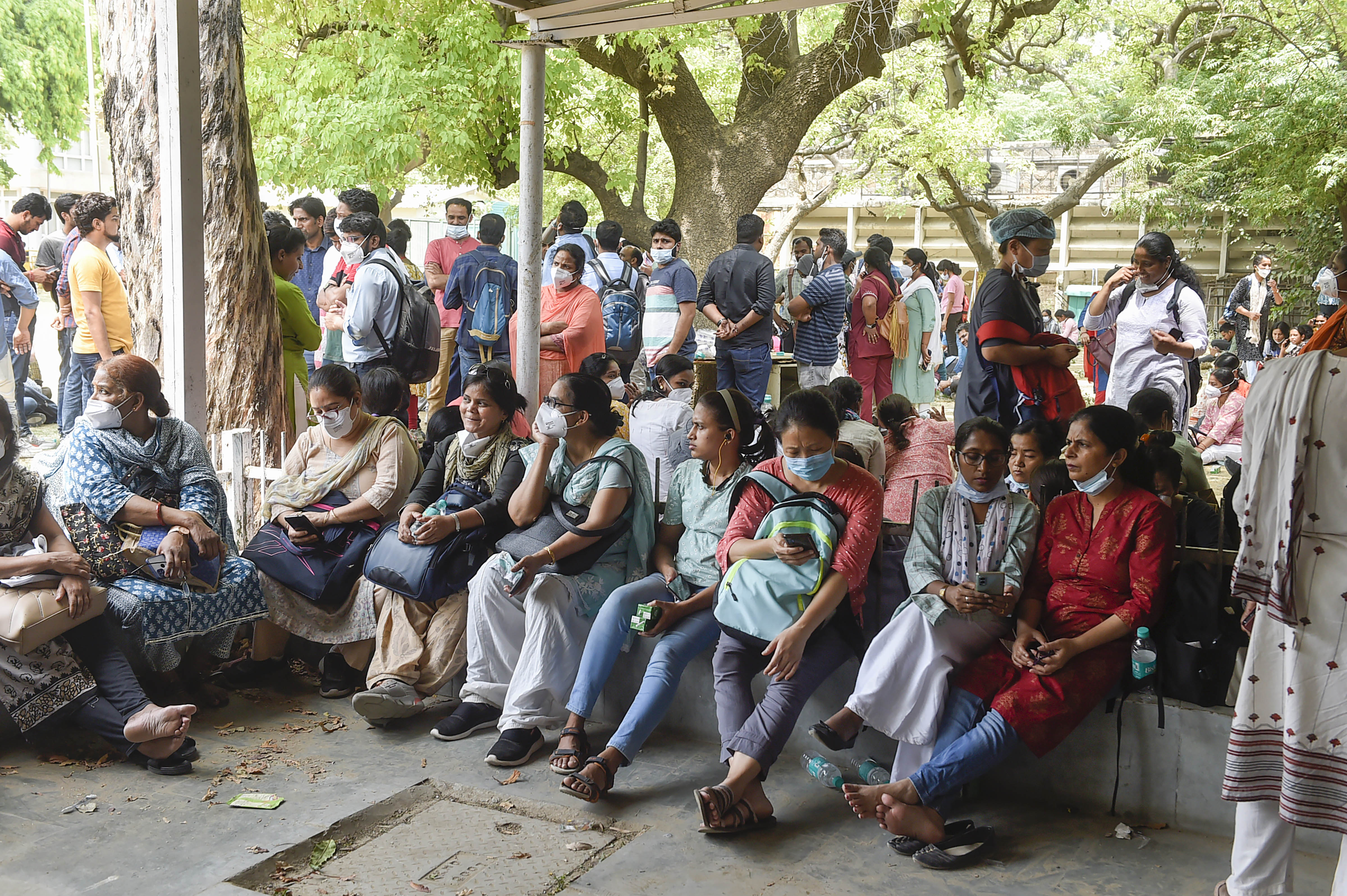 AIIMS nursing staff during a strike after the suspension of AIIMS nursing officer Harish Kajla, at AIIMS in New Delhi, Tuesday, April 26, 2022. (PTI Photo/Arun Sharma) AIIMS nursing staff during a strike after the suspension of AIIMS nursing officer Harish Kajla, at AIIMS in New Delhi, Tuesday, April 26, 2022. (PTI Photo/Arun Sharma)