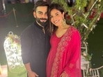 Anushka Sharma and Virat Kohli posing at Glenn Maxwell's wedding function in Mumbai.