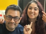 Aamir Khan poses with daughter Ira Khan after doing her make-up. Aamir Khan poses with daughter Ira Khan after doing her make-up.
