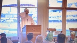 A muezzin gives a call for prayers, also called azaan, during the iftar hosted at the Long Room of the Lord's Cricket Ground in London.&nbsp;