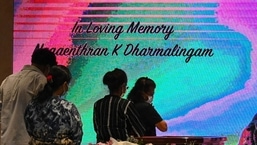 People pay tribute at a wake for Malaysian national Nagaenthran K. Dharmalingam, who was executed for trafficking heroin into Singapore, during a memorial service in Singapore on April 27, 2022.