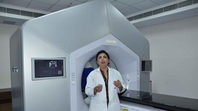 Dr Sandhya Sood from DMCH cancer care center demonstrating Halcyon E machine for radiotherapy installed in hospital campus in Ludhiana on April 28, 2022. (Harvinder Singh/HT)