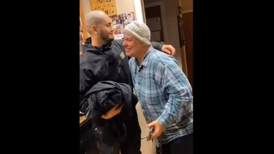 The man hugs his mother-in-law after shaving his head to support her cancer treatment journey in this Instagram video. (Instagram/@goodnewscorrespondent) The man hugs his mother-in-law after shaving his head to support her cancer treatment journey in this Instagram video. (Instagram/@goodnewscorrespondent)