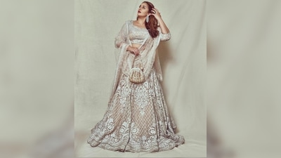 If you don't mind going a little dramatic with your look then this ivory lehenga set worn by Huma Qureshi is the best inspiration for your Eid 2022 look. You can accessorise it with a pot and a pair of statement earrings. (Instagram/@iamhumaq) If you don't mind going a little dramatic with your look then this ivory lehenga set worn by Huma Qureshi is the best inspiration for your Eid 2022 look. You can accessorise it with a pot and a pair of statement earrings. (Instagram/@iamhumaq)
