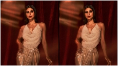 The top came intricately decorated in white beads. In silver rings, mouni accessorised her look. (Instagram/@imouniroy)