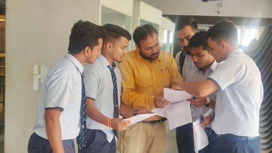 CISCE ISC Commerce term 2 Exams 2022: Students of CMS Kanpur Road branch discuss Commerce question paper after ISC exam on Thursday.(HT Photo) CISCE ISC Commerce term 2 Exams 2022: Students of CMS Kanpur Road branch discuss Commerce question paper after ISC exam on Thursday.(HT Photo)