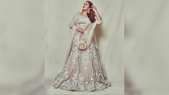 If you don't mind going a little dramatic with your look then this ivory lehenga set worn by Huma Qureshi is the best inspiration for your Eid 2022 look. You can accessorise it with a pot and a pair of statement earrings.(Instagram/@iamhumaq)