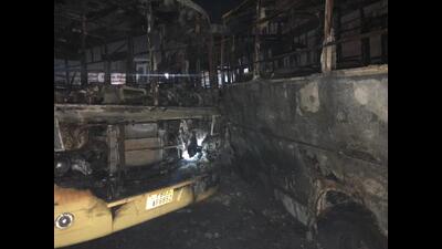The charred remains of the buses that were burnt after a fire broke out at the Bhagta Bhai Ka bus stand, 40km from Bathinda, late on Thursday night. (Sanjeev Kumar/HT)