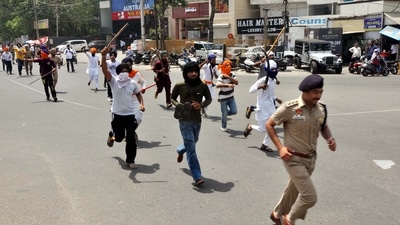A clash erupted between two groups near Kali Devi Temple, in Patiala on Friday. (ANI Photo) (Ajay Sharma) A clash erupted between two groups near Kali Devi Temple, in Patiala on Friday. (ANI Photo) (Ajay Sharma)