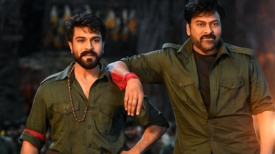 Chiranjeevi and Ram Charan in a still from their recent release Acharya. Chiranjeevi and Ram Charan in a still from their recent release Acharya.