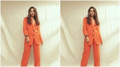 Tamannaah earlier turned muse for the fashion designer house Aak:Ch and aced the boss lady look in this vibrant orange a pant suit from their wardrobe. (Instagram/@tamannaahspeaks)