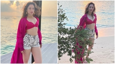 Taking beach fashion to a whole new level, Tamannaah Bhatia stunned in this fuschia pink bikini top and white printed shorts as she vacations in the Maldives. (Instagram/@tamannaahspeaks) Taking beach fashion to a whole new level, Tamannaah Bhatia stunned in this fuschia pink bikini top and white printed shorts as she vacations in the Maldives. (Instagram/@tamannaahspeaks)
