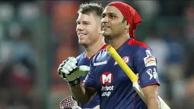 David Warner with Virender Sehwag. (PTI) David Warner with Virender Sehwag. (PTI)