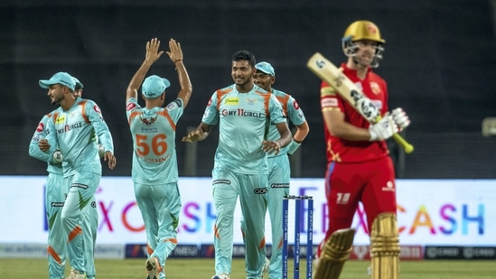 Mohsin Khan of Lucknow Super Giants celebrates the wicket of Liam Livingstone of Punjab Kings during the Indian Premier League 2022 (PTI)