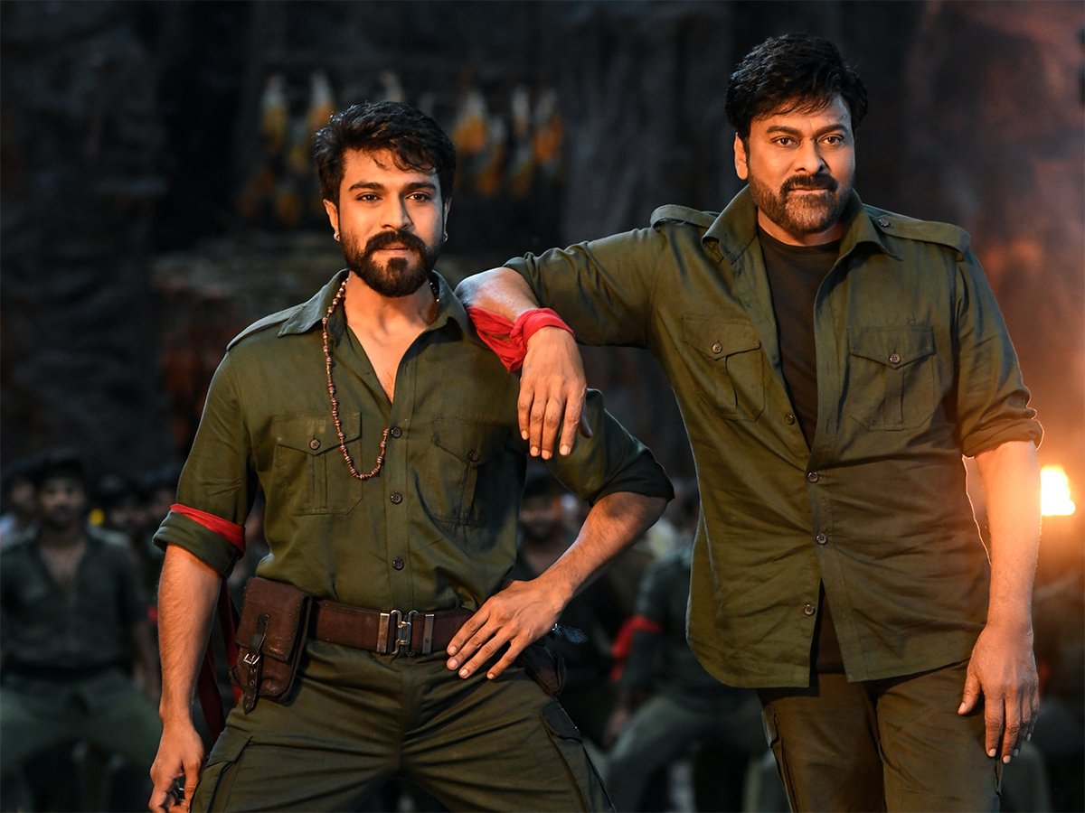 Chiranjeevi and Ram Charan in a still from their film Acharya. Chiranjeevi and Ram Charan in a still from their film Acharya.