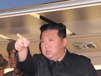 North Korean leader Kim Jong Un gestures as he watches the test-firing of a new-type tactical guided weapon according to state media.