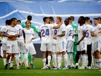 Real Madrid's Daniel Ceballos, Mariano Diaz, Ferland Mendy, Eduardo Camavinga and team members celebrate after winning LaLiga