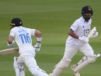 Rizwan (L) and Pujara Rizwan (L) and Pujara