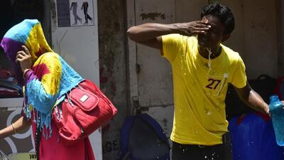 Mumbai, India - April 28, 2022: A youth washes his face for little respite in the sweltering heat as mercury rises, in Mumbai, India, on Thursday, April 28, 2022. (Photo by Anshuman Poyrekar/Hindustan Times) (Anshuman Poyrekar/HT Photo) Mumbai, India - April 28, 2022: A youth washes his face for little respite in the sweltering heat as mercury rises, in Mumbai, India, on Thursday, April 28, 2022. (Photo by Anshuman Poyrekar/Hindustan Times) (Anshuman Poyrekar/HT Photo)