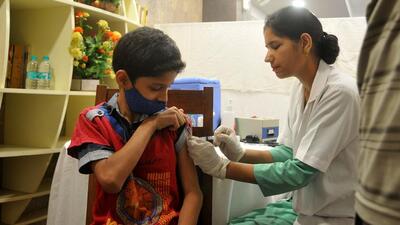 A health worker administering anti-Covid vaccine to a boy during a special vaccination camp for children at the Chandigarh Press Club on Saturday. The tricity logged 29 fresh Covid cases on Saturday, up from 14 the day before (Ravi Kumar/HT)