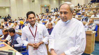 Odisha chief minister Naveen Patnaik with Andhra Pradesh chief minister YS Jagan Mohan Reddy during a joint conference of CMs of states & Chief Justices of High Courts at Vigyan Bhawan in New Delhi on Saturday. (PTI PHOTO.) Odisha chief minister Naveen Patnaik with Andhra Pradesh chief minister YS Jagan Mohan Reddy during a joint conference of CMs of states & Chief Justices of High Courts at Vigyan Bhawan in New Delhi on Saturday. (PTI PHOTO.)