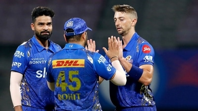 Mumbai Indians Daniel Sams celebrates the dismissal of Rajasthan Royals Daryl Mitchell during the Indian Premier League 2022 match between Rajasthan Royals and Mumbai Indians, at Dr DY Patil Sports Academy in Mumbai on Saturday.&nbsp; (ANI)