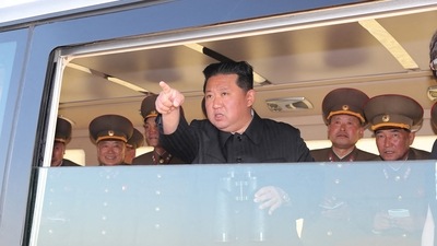 North Korean leader Kim Jong Un gestures as he watches the test-firing of a new-type tactical guided weapon according to state media. (via Reuters)