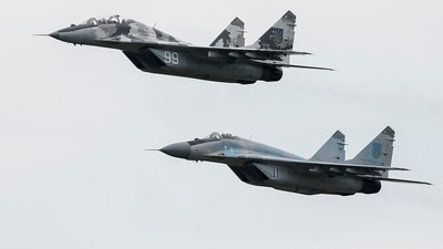 MIG-29 fighter aircrafts fly at a military air base in Vasylkiv, Ukraine. (REUTERS)