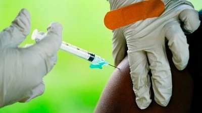 &nbsp;A health worker administers a dose of the Covid-19 vaccine.&nbsp; (AP)