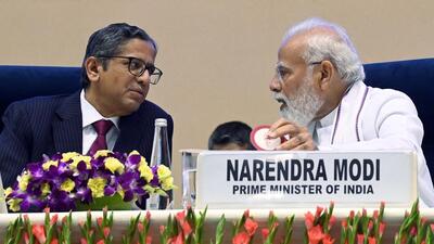 Prime Minister Narendra Modi interacts with Chief Justice of India (CJI) N V Ramana during the joint conference of Chief Ministers of states and Chief Justices of High Courts at Vigyan Bhawan in New Delhi on Saturday. (ANI PHOTO.) Prime Minister Narendra Modi interacts with Chief Justice of India (CJI) N V Ramana during the joint conference of Chief Ministers of states and Chief Justices of High Courts at Vigyan Bhawan in New Delhi on Saturday. (ANI PHOTO.)