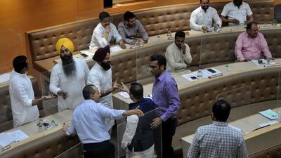 Councillors arguing during the monthly MC House meeting at the MC Office in Sector 17, Chandigarh, on Saturday. (Ravi Kumar/HT) Councillors arguing during the monthly MC House meeting at the MC Office in Sector 17, Chandigarh, on Saturday. (Ravi Kumar/HT)