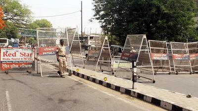Police personnel stand guard near Kali Devi Temple to maintain law and order following the Friday clash, in Patiala on Saturday. (ANI Photo) Police personnel stand guard near Kali Devi Temple to maintain law and order following the Friday clash, in Patiala on Saturday. (ANI Photo)