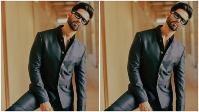 Shahid’s blazer features golden buttons. In statement tinted shades from R Kunar Opticians, Shahid accessorised his look. (Instagram/@shahidkapoor)