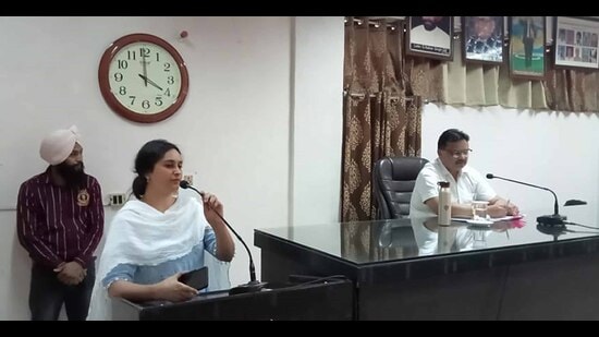 MC commissioner Pardeep Sabharwal chairing a meeting regarding monsoon preparedness at the civic body’s Zone-A office in Ludhiana on Friday evening. (Harvinder Singh/HT )