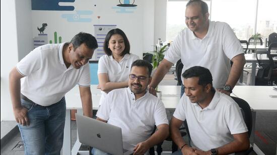 (From left, standing) Dhananjaya Shetty, Manjari Sharma, Nitish Rai; (From left, sitting) Sandeep Mukhopadhyay and Vikas Singh, co-founders of FreightFox at Vimannagar, on Thursday. (Shankar Narayan/HT PHOTO) (From left, standing) Dhananjaya Shetty, Manjari Sharma, Nitish Rai; (From left, sitting) Sandeep Mukhopadhyay and Vikas Singh, co-founders of FreightFox at Vimannagar, on Thursday. (Shankar Narayan/HT PHOTO)