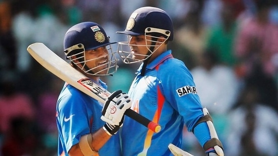 Sachin Tendulkar with Virender Sehwag.(Getty)